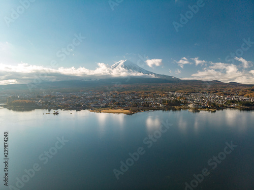 Aerial view over lake Kawaguchi, located in the border Fujikawaguchiko and Minobu, southern Yamanashi Prefecture near Mount Fuji, Japan. Lake Kawaguchi is a very popular tourist spot near Fuji Japan.