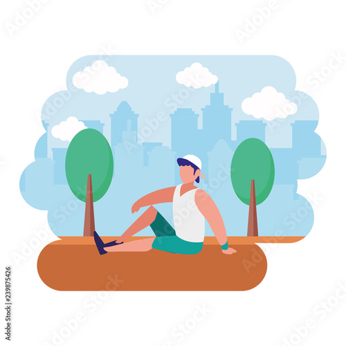 man making yoga in the park city