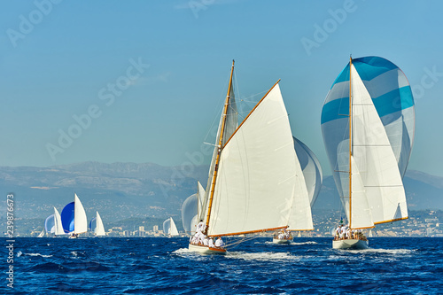 Sailing yacht race regatta. Sailboat in the sea under sail. Yachting sport