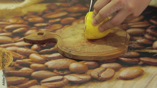 Wallpaper Mural The guy cuts a lemon with a knife. Torontodigital.ca