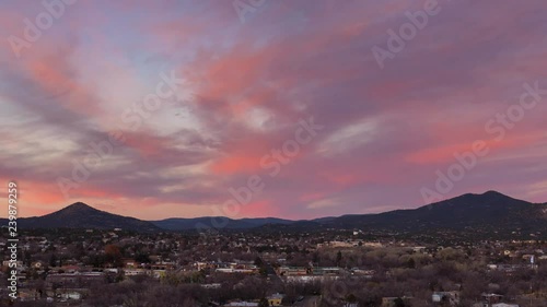 Beautiful sunset timelapse over a small mountain town 