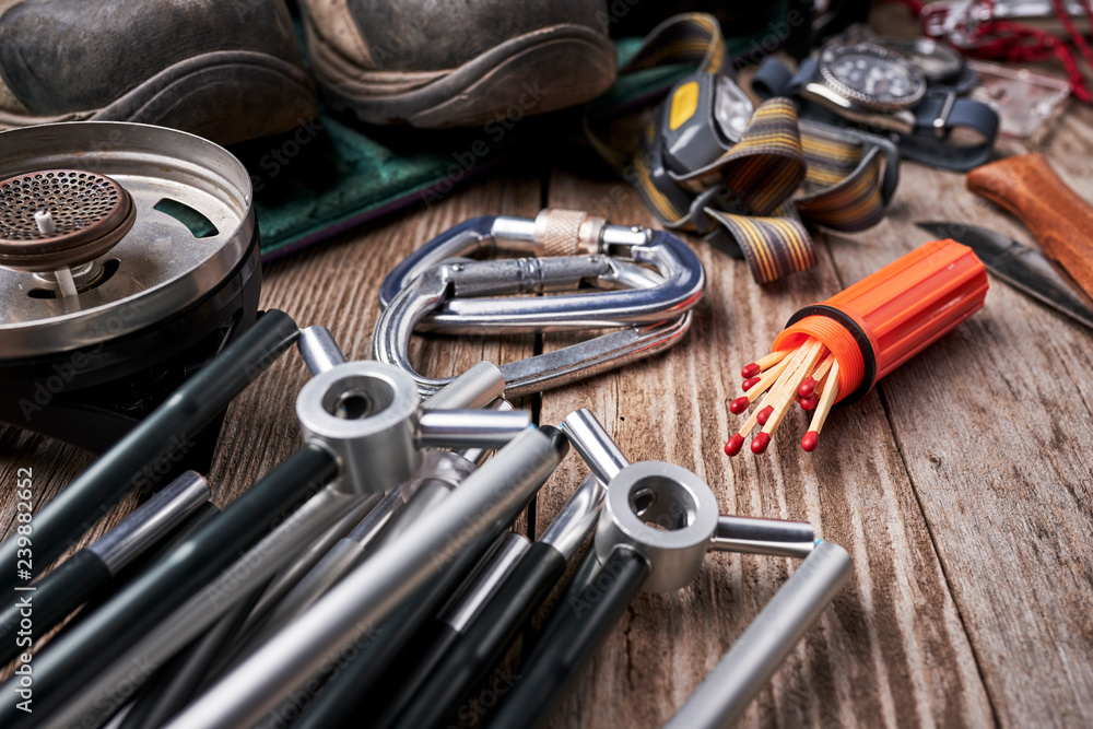 Fototapeta premium campiing gear on a wood table