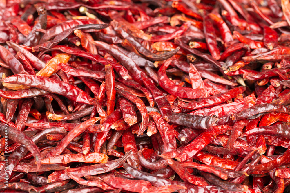 Dried red chilli or chilli cayenne peppers on vintage background tone Dried red chilli or chilli cayenne peppers on vintage background tone