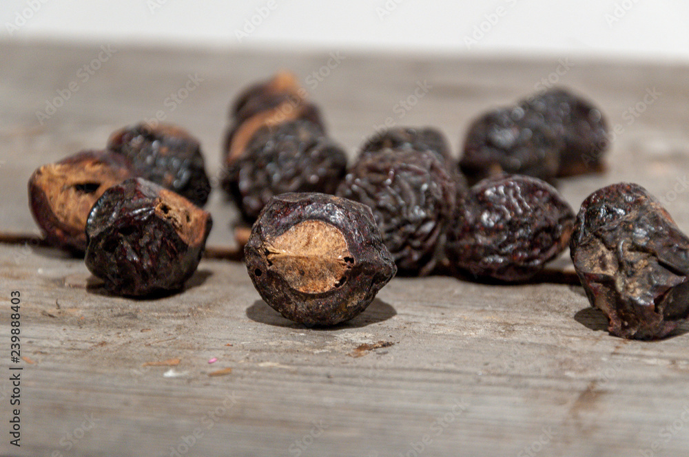 soapnuts on a wooden table soapnuts on a wooden table
