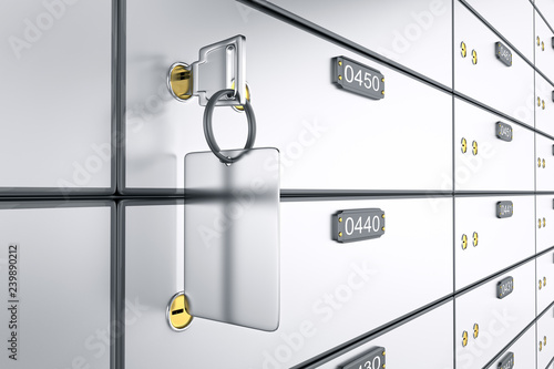 Safe deposit boxes with key. 3D rendering. Safe lockers photo