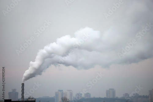 Smoke coming out of factory chimney.