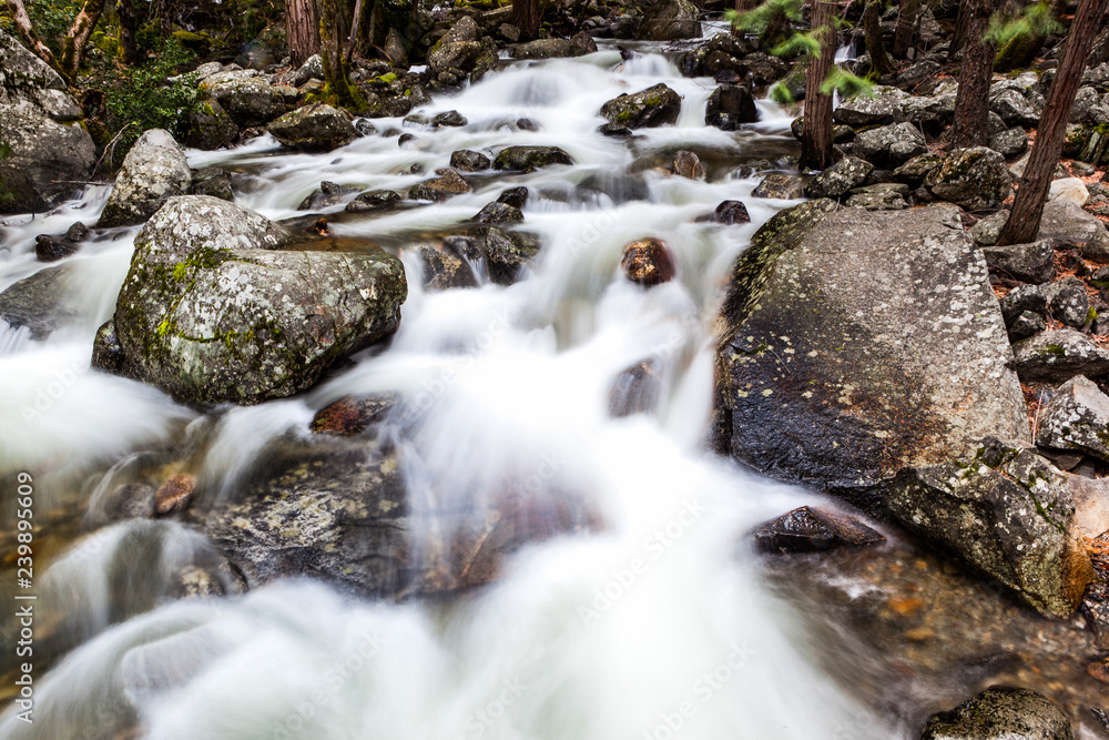 Small stream and waterfalls in Yosemite National Park, California Small stream and waterfalls in Yosemite National Park, California