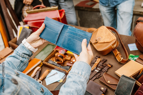 Handmade leather wallet. Fashion accessory concept photo