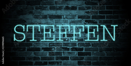 first name Steffen in blue neon on brick wall photo
