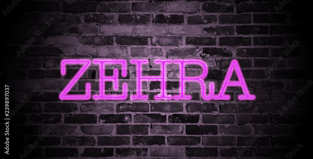 Obraz premium first name Zehra in pink neon on brick wall