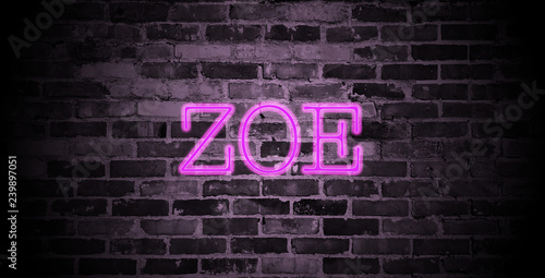 first name Zoe in pink neon on brick wall