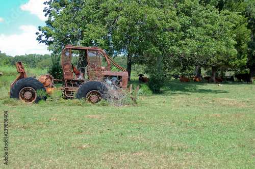 old grader in field