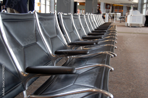 rows of empty seats in airport