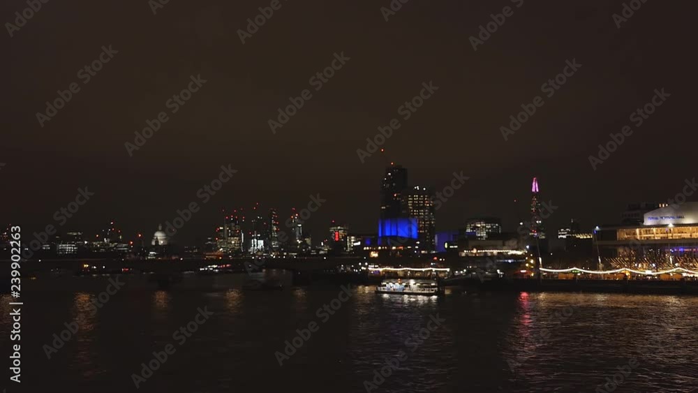 The view of central London across the river at night. The view of central London across the river at night.