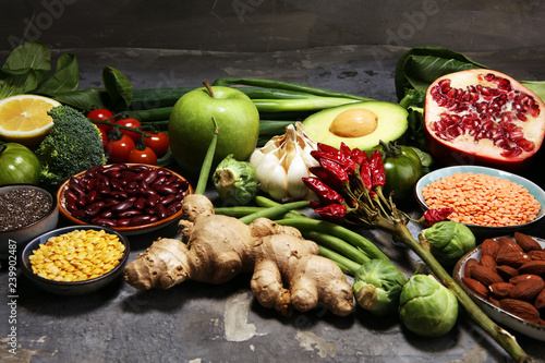 Fototapeta Naklejka Na Ścianę i Meble -  Healthy food clean eating selection. fruit, vegetable, seeds, superfood, cereals, leaf vegetable on rustic background