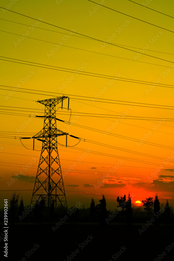 electric tower in the setting sun