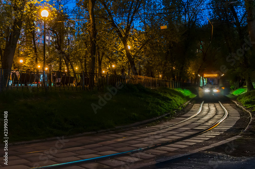 The movement of trams on the bend of the road,