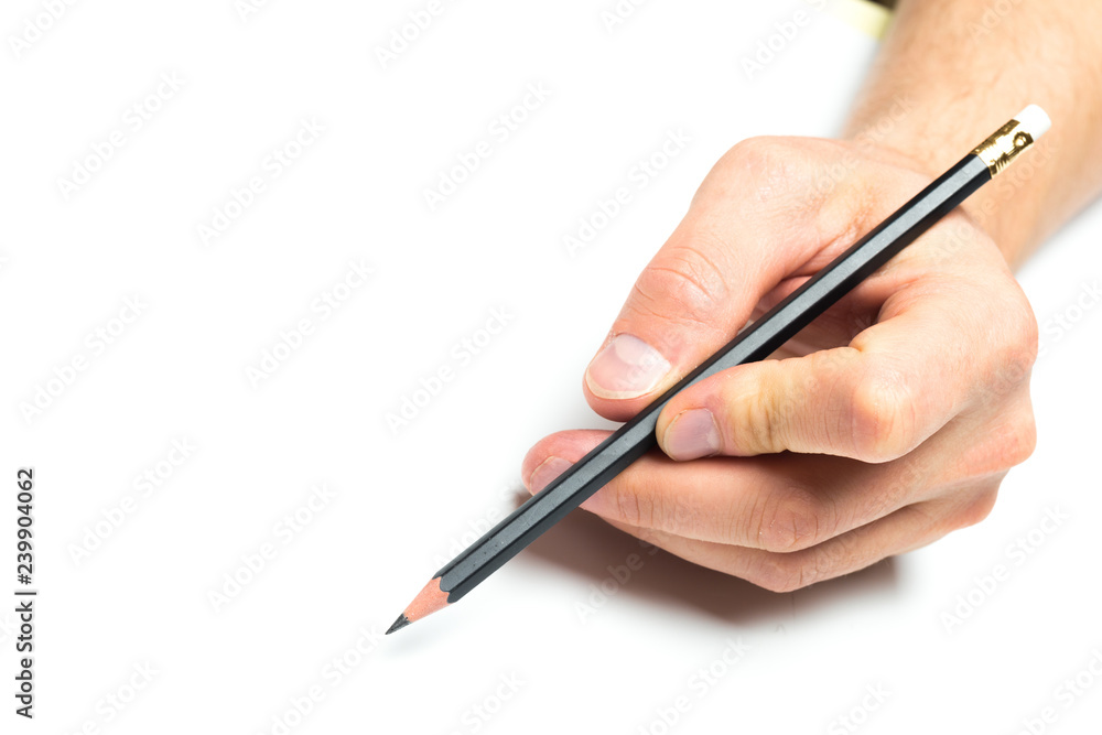 Men's hand holding wooden pencil on isolated backgroung, close up Men's hand holding wooden pencil on isolated backgroung, close up