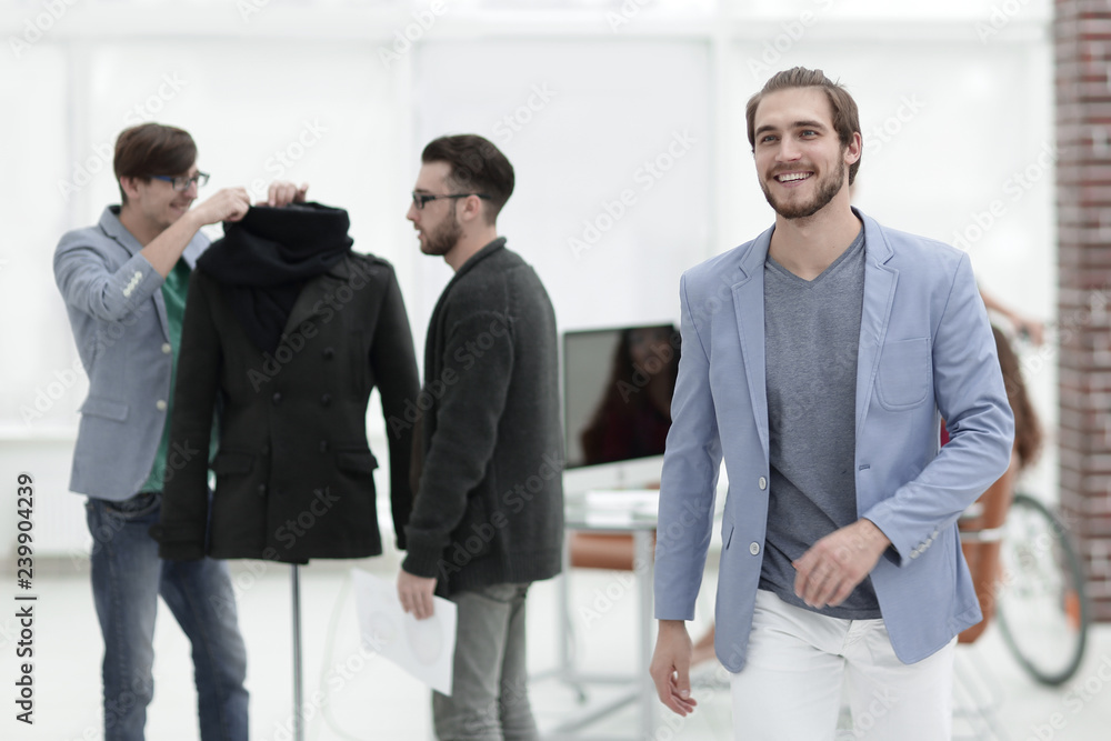 tailors and designers working on new models of clothes. tailors and designers working on new models of clothes.
