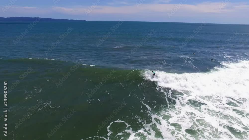 Surfers surfing big waves aerial drone view. Surfers ready to surf the waves in the Caribbean Sea. Water sports videos aerial drone view. Surfers surfing big waves aerial drone view. Surfers ready to surf the waves in the Caribbean Sea. Water sports videos aerial drone view.