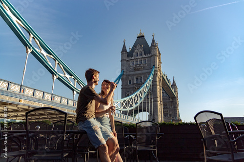 couple enjoy sunset next tower bridge