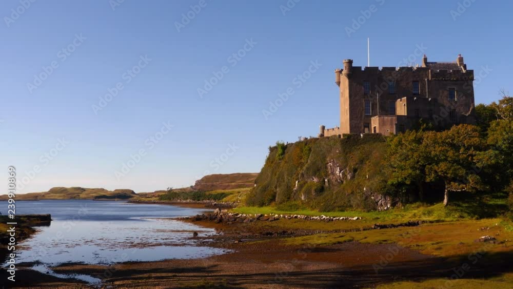 Dunvegan Castle on the shore of Loch Dunvegan in Isle of Skye, Scotland Dunvegan Castle on the shore of Loch Dunvegan in Isle of Skye, Scotland
