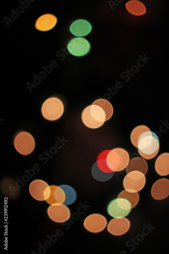 Blurred defocused christmas light lights bokeh background. Colorful red yello...