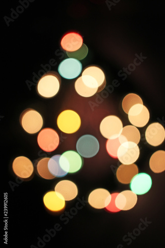 Blurred defocused christmas light lights bokeh background. Colorful red yello...