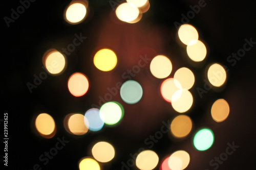 Blurred defocused christmas light lights bokeh background. Colorful red yello...