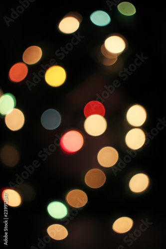 Blurred defocused christmas light lights bokeh background. Colorful red yello...