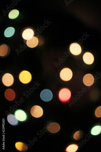 Blurred defocused christmas light lights bokeh background. Colorful red yello...
