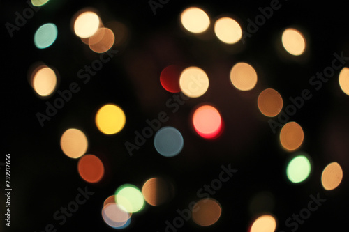 Blurred defocused christmas light lights bokeh background. Colorful red yello...