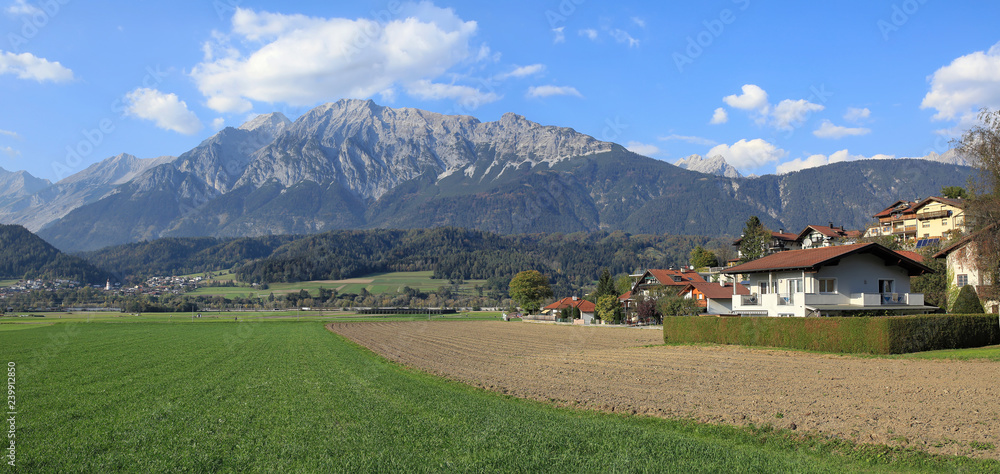 Panoramic view of the market town of Wattens against the Karwendel mountains. Wattens, Innsbruck-Land district, state of Tyrol, Austria.