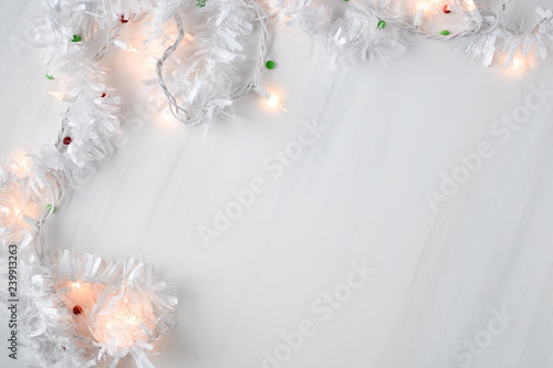 Wallpaper Mural White holiday christmas lights strand around a blank white backdrop Torontodigital.ca