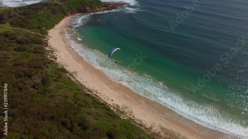 Amazing drone footage of paragliders out at sea photo