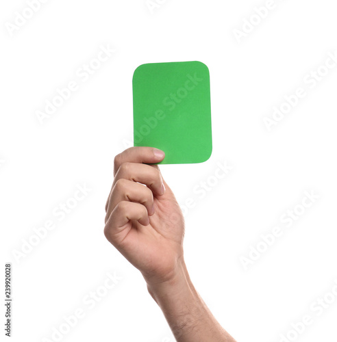 Man holding green card on white background, closeup of hand