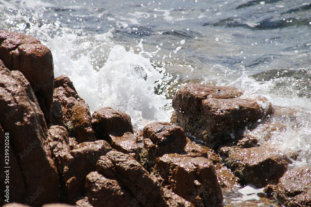 waves crashing on rocks