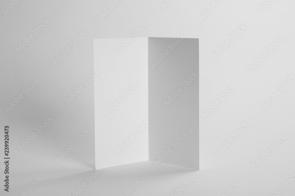 Blank brochure on white background. Mock up for design Blank brochure on white background. Mock up for design