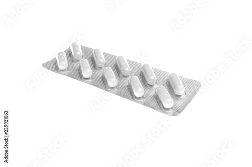 Pills in blister pack on white background