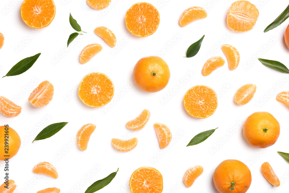 Composition with tangerines and leaves on white background, top view Composition with tangerines and leaves on white background, top view