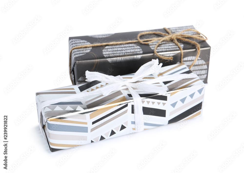 Beautiful gift boxes with bows on white background