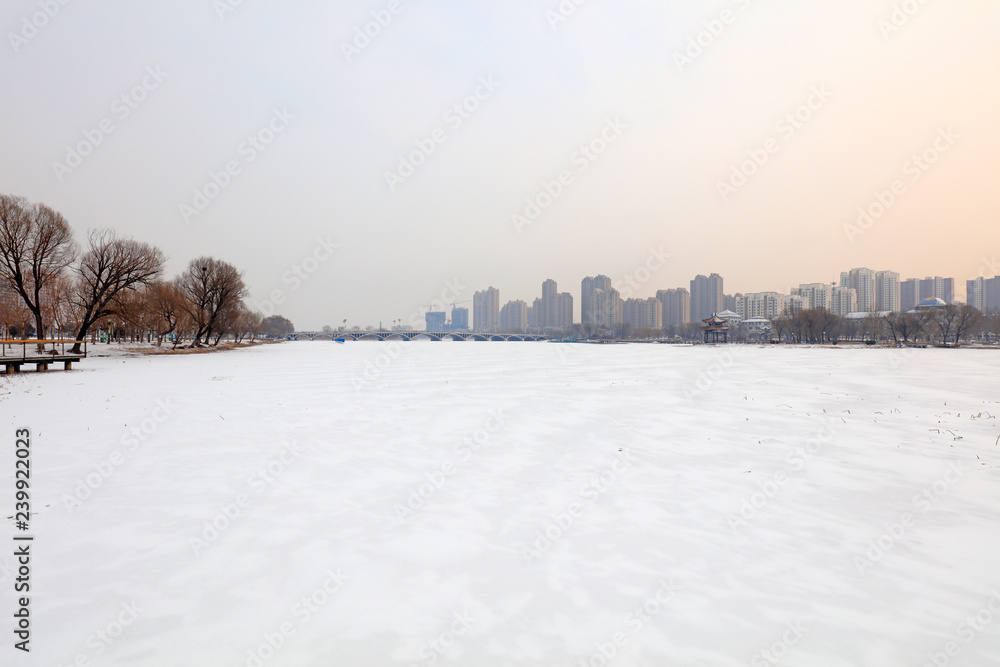 Fototapeta premium Urban buildings in the snow, China