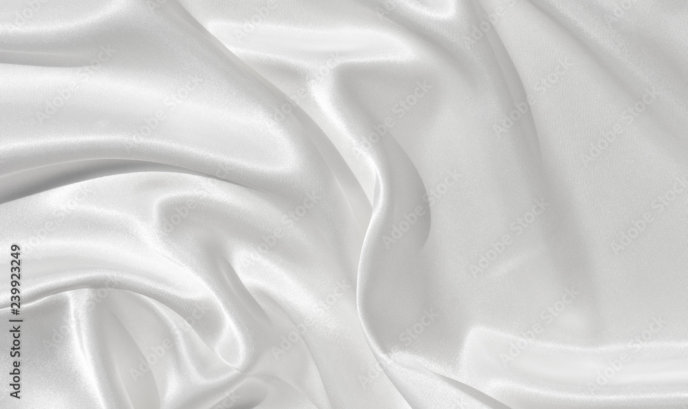 Naklejka premium The texture of the satin fabric of white color for the background