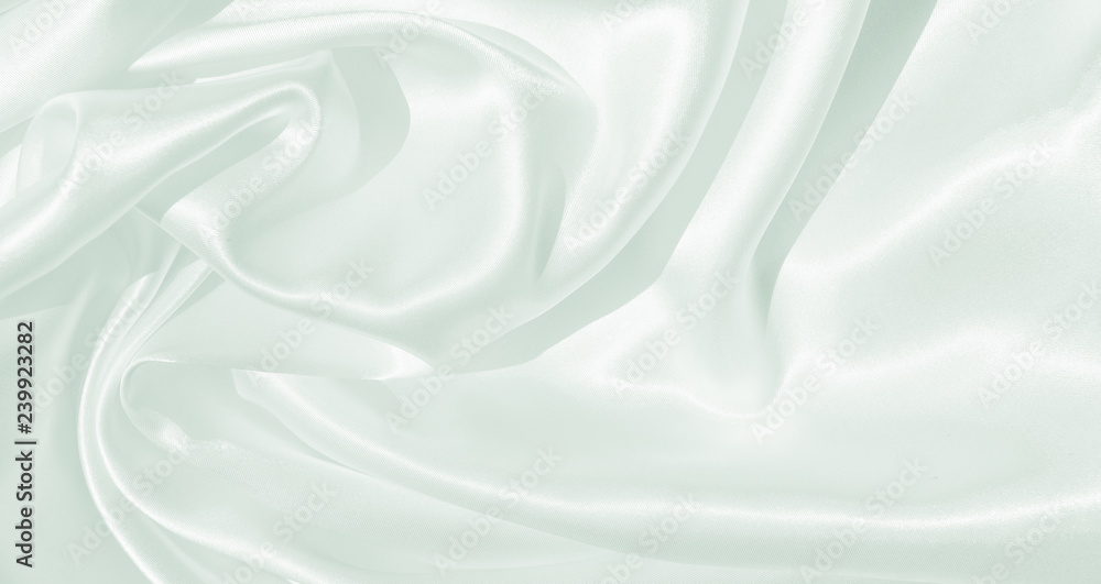 Naklejka premium The texture of the satin fabric of blue color for the background