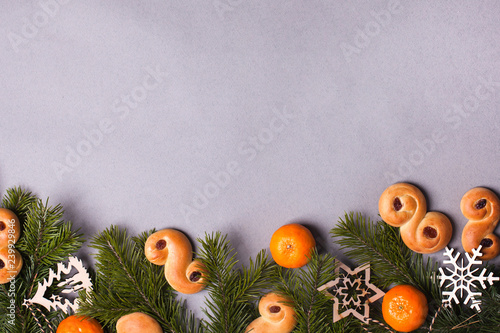 Fotografie Frame with Traditional saffron buns, tradition in Sweden at Lucia and Christmas,