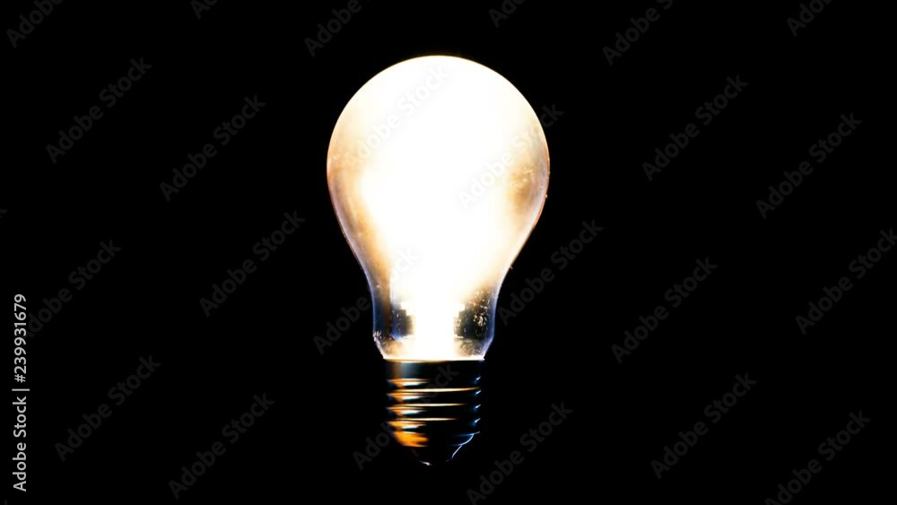 Beautiful concept of the incandescent light bulb on black background Beautiful concept of the incandescent light bulb on black background