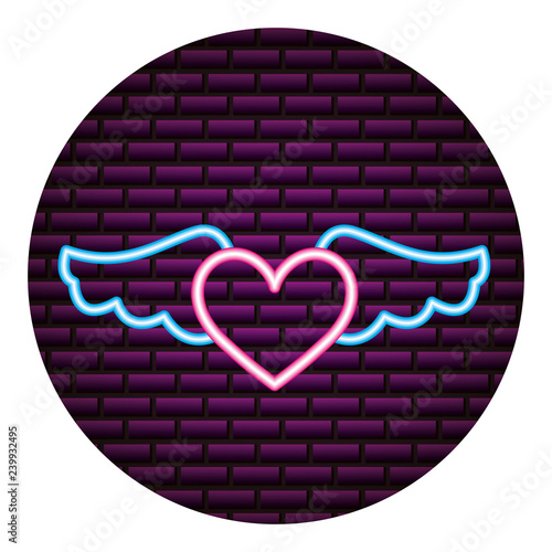 heart wings neon brick wall