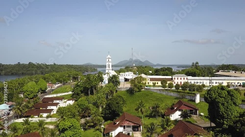 Aerial Drone Establishing Shot over the top of the Muncipality of Sao Gabriel da Cachoeira Brazil Punching in on a Picturesque Church. photo