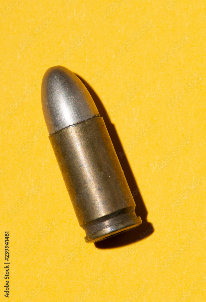 One weapon ammunition cartridge isolated One weapon ammunition cartridge isolated