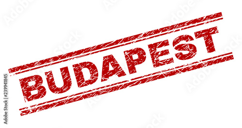 BUDAPEST seal print with corroded texture. Red vector rubber print of BUDAPEST title with unclean texture. Text title is placed between double parallel lines.